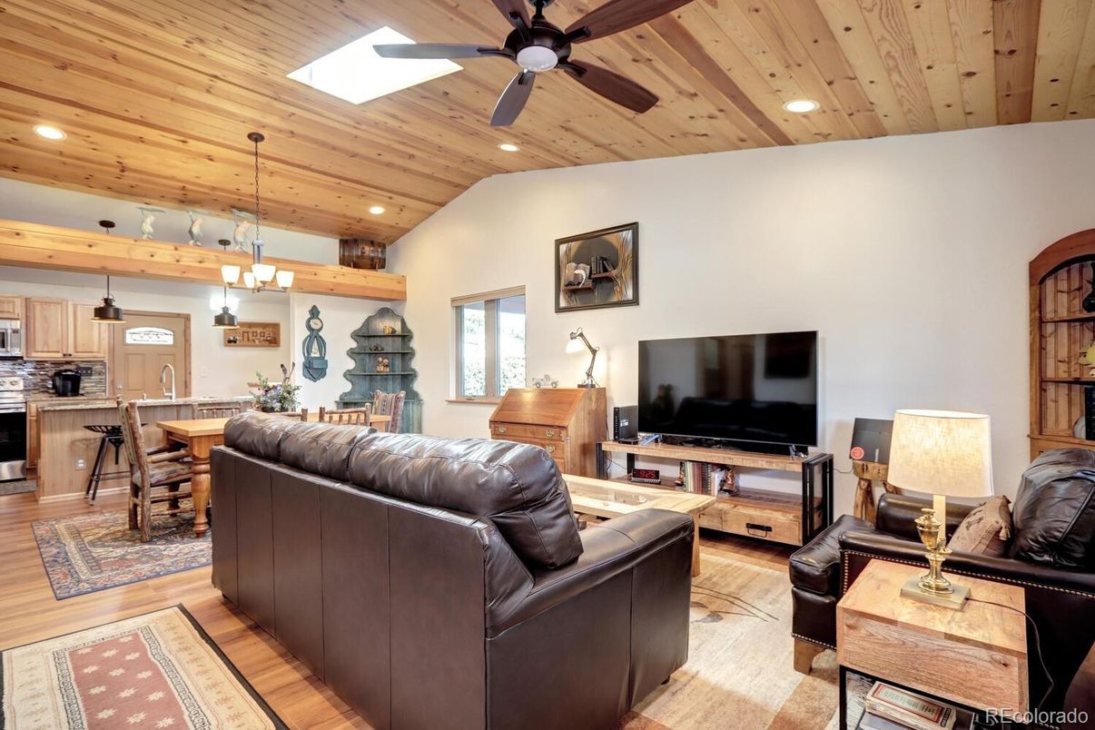 Dining room, Interior, Kitchen, Living room, Pendant Lights, Recessed Lighting, Stainless Steel Appliances, Wooden Beams, Wooden Ceilings, Wood Texture Flooring