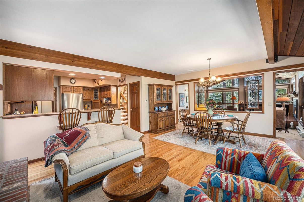 Chandelier, Dining room, Interior, Kitchen, Living room, Recessed Lighting, Stainless Steel Appliances, Wood Texture Flooring