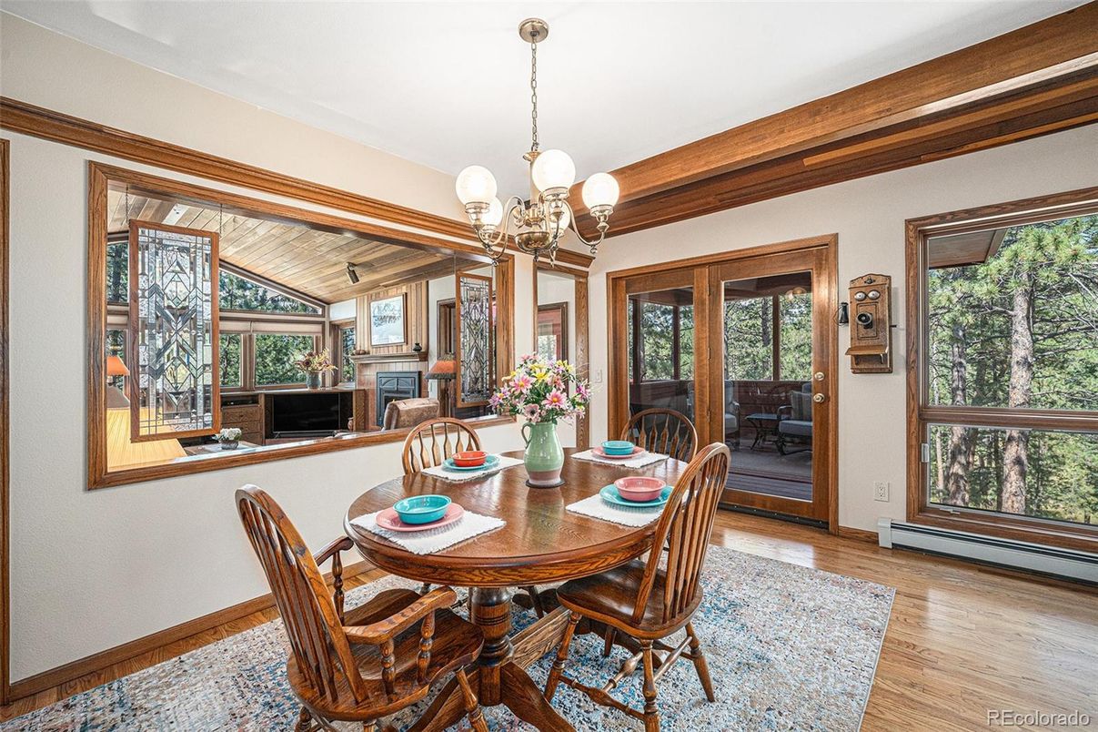 Chandelier, Dining room, Fireplace, Interior, Wooden Ceilings, Wood Texture Flooring