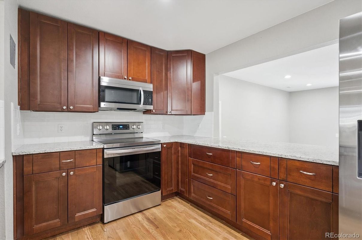 Interior, Kitchen, Recessed Lighting, Stainless Steel Appliances, Wood Texture Flooring