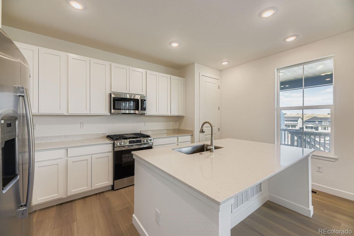 Interior, Kitchen, Recessed Lighting, Stainless Steel Appliances, Wood Texture Flooring