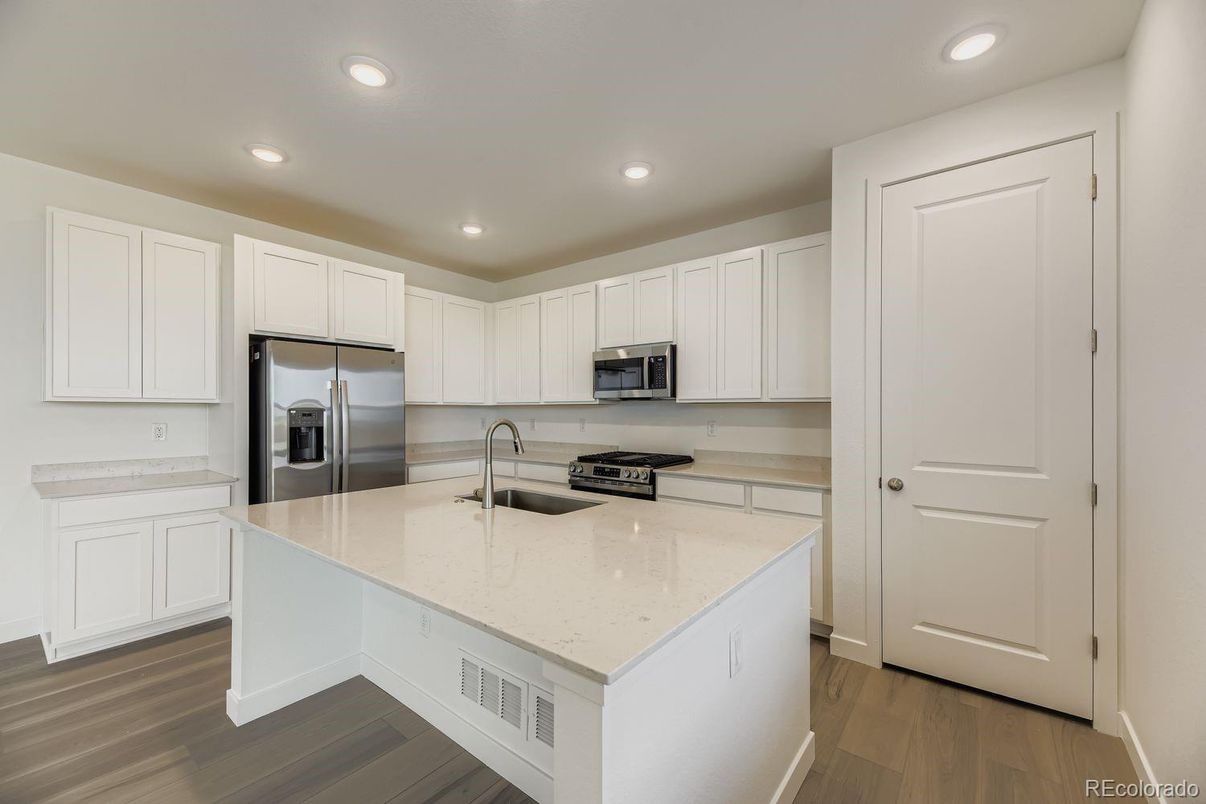 Interior, Kitchen, Recessed Lighting, Stainless Steel Appliances, Wood Texture Flooring