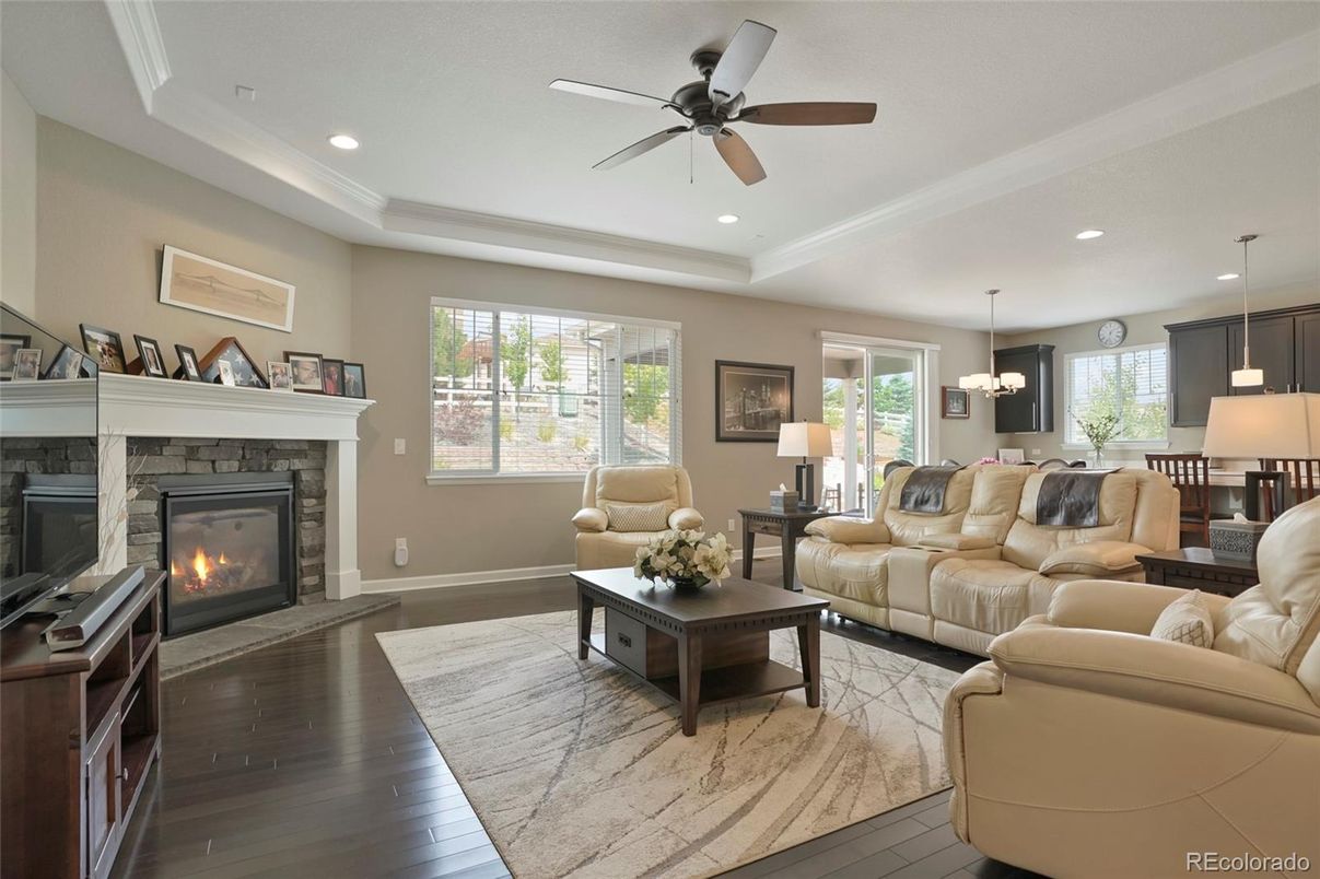 Dining room, Fireplace, Interior, Living room, Pendant Lights, Recessed Lighting, Wood Texture Flooring