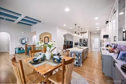Dining room, Interior, Kitchen, Pendant Lights, Recessed Lighting, Stainless Steel Appliances, Wood Texture Flooring