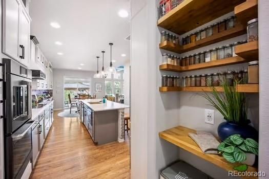 Dining room, Interior, Kitchen, Pendant Lights, Recessed Lighting, Stainless Steel Appliances, Wood Texture Flooring