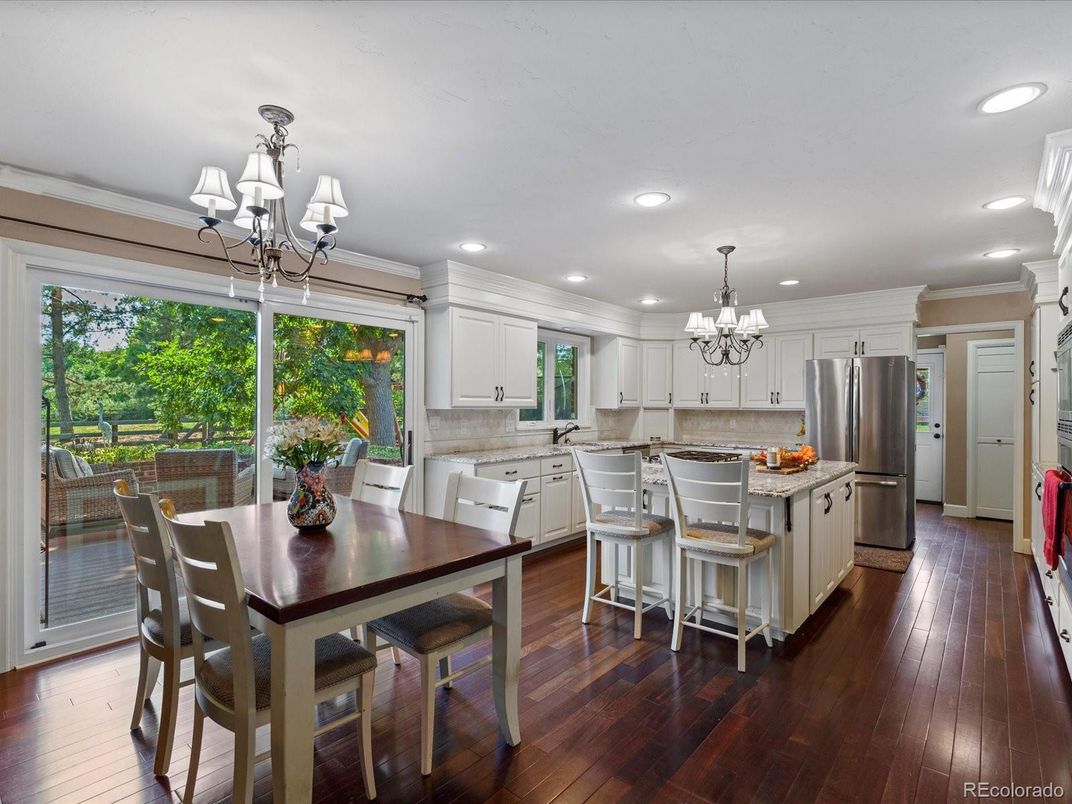Chandelier, Dining room, Interior, Kitchen, Recessed Lighting, Stainless Steel Appliances, Wood Texture Flooring