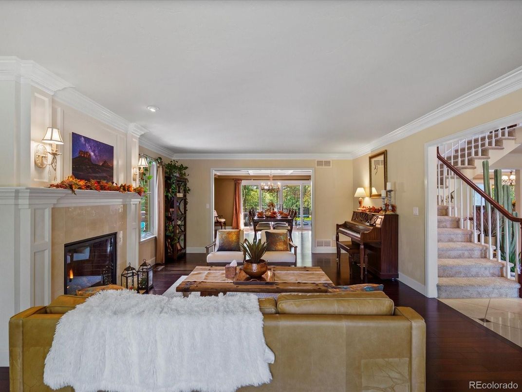 Fireplace, Interior, Living room, Piano, Recessed Lighting, Wood Texture Flooring