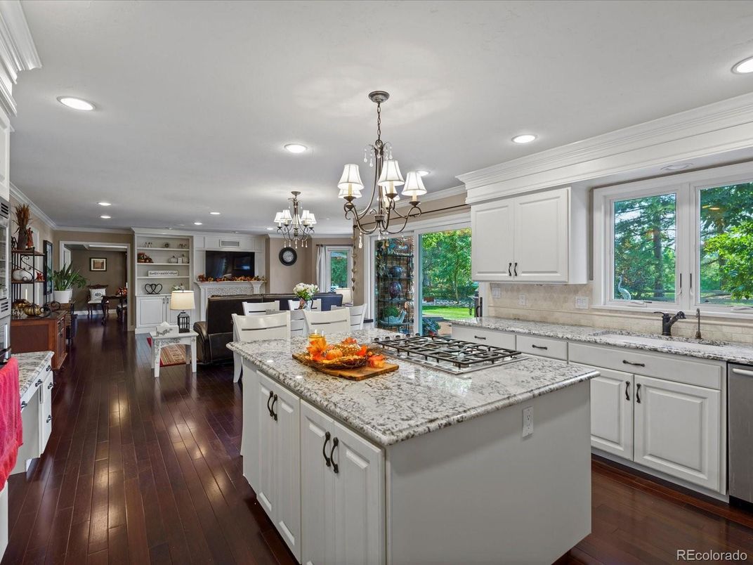 Chandelier, Dining room, Interior, Kitchen, Living room, Recessed Lighting, Wood Texture Flooring