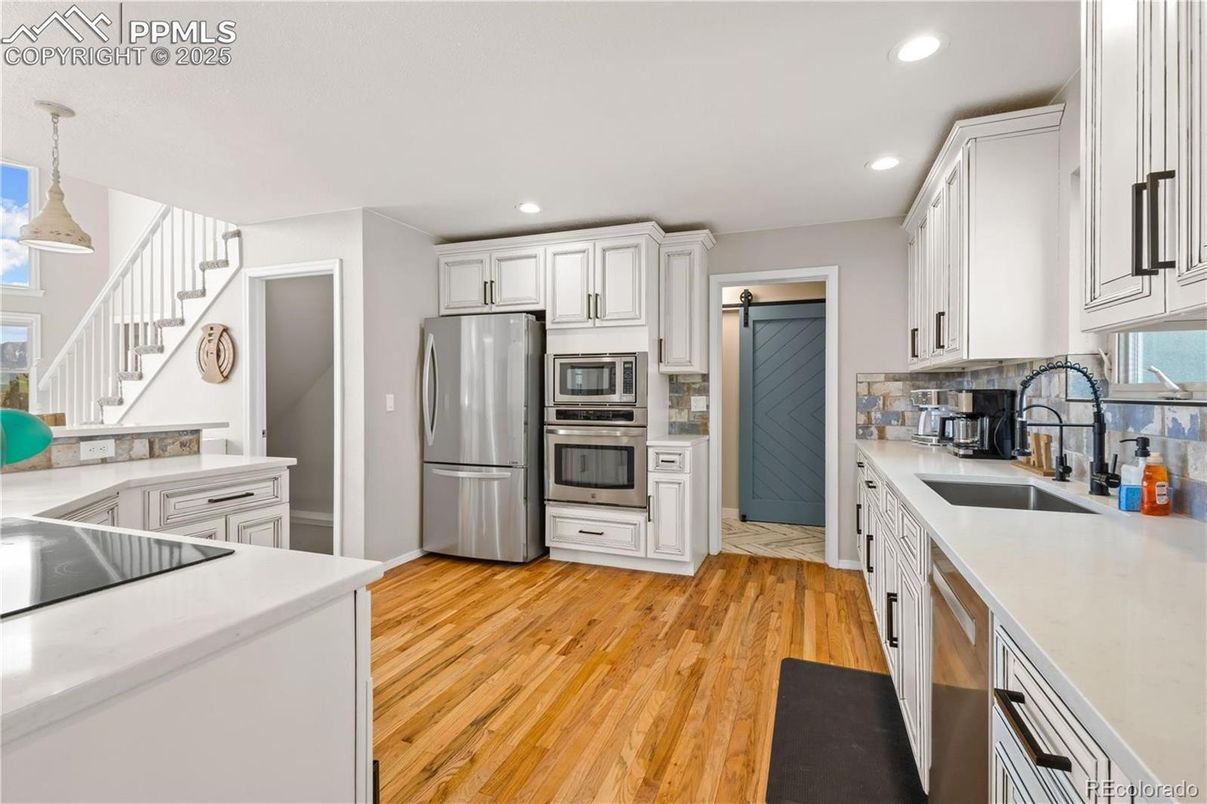 Interior, Kitchen, Pendant Lights, Recessed Lighting, Stainless Steel Appliances, Wood Texture Flooring