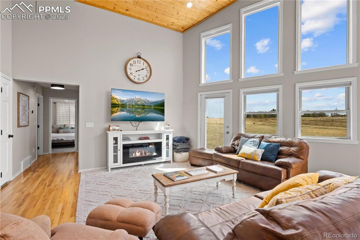 Fireplace, Interior, Living room, Recessed Lighting, Wooden Ceilings, Wood Texture Flooring