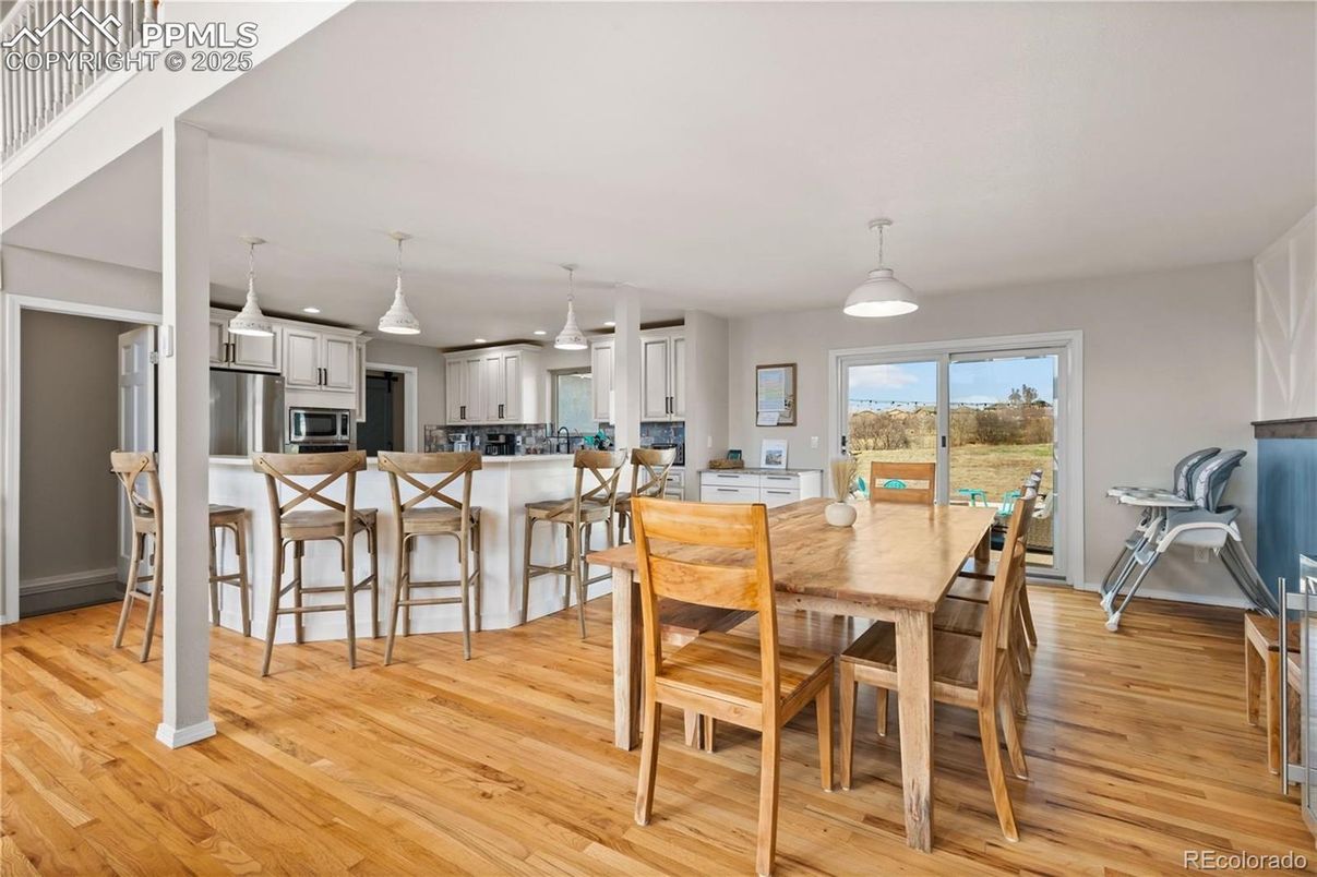 Dining room, Interior, Kitchen, Pendant Lights, Stainless Steel Appliances, Wood Texture Flooring