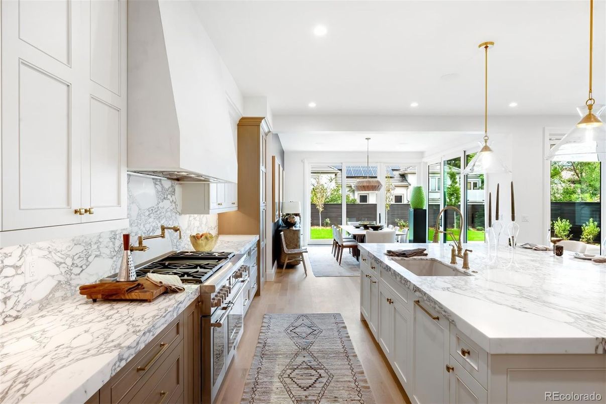 Dining room, Interior, Kitchen, Pendant Lights, Recessed Lighting, Stainless Steel Appliances, Wood Texture Flooring