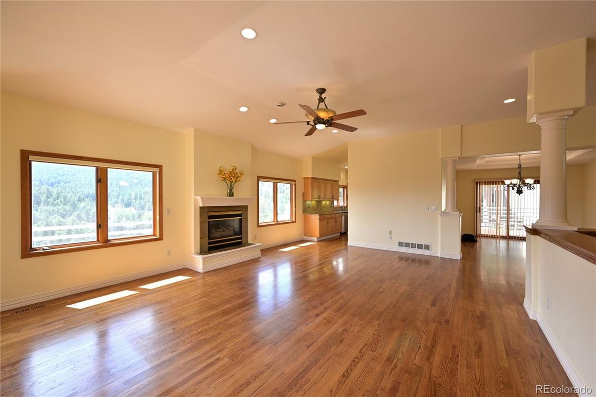 Chandelier, Empty room, Fireplace, Interior, Recessed Lighting, Wood Texture Flooring