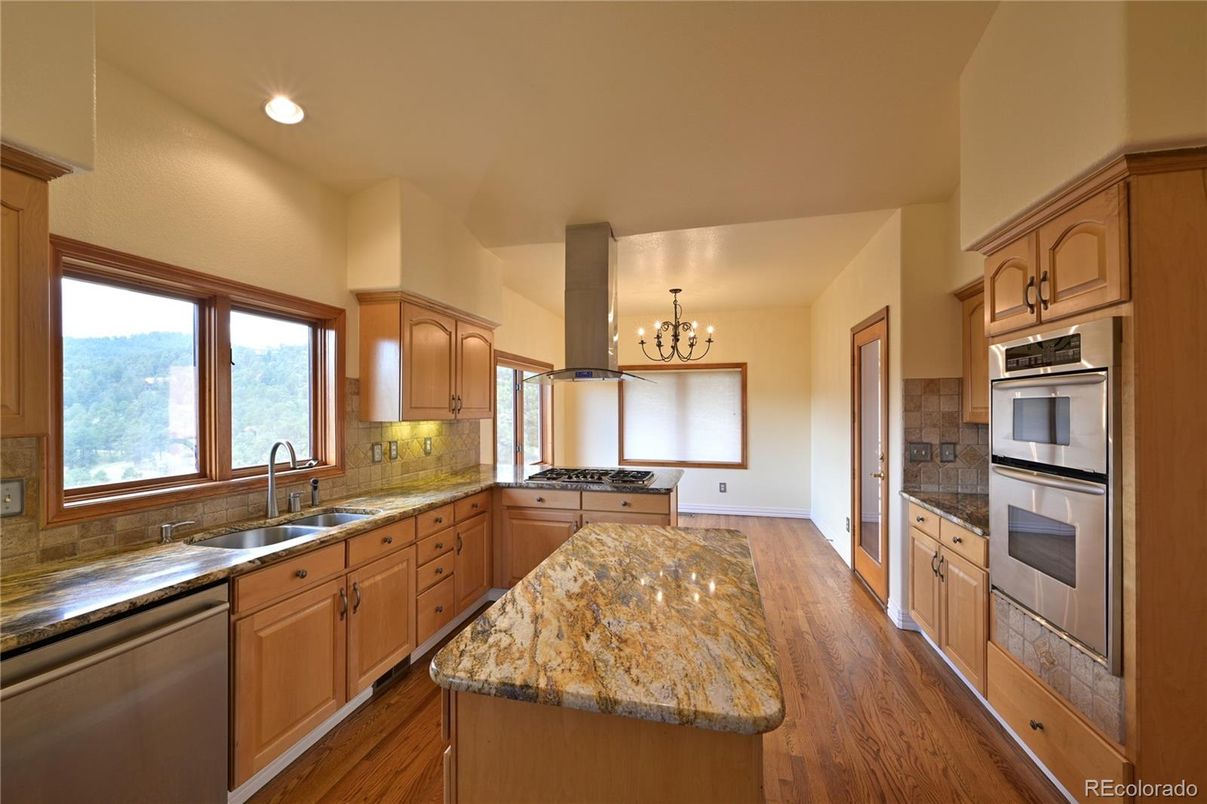 Chandelier, Interior, Kitchen, Recessed Lighting, Stainless Steel Appliances, Wood Texture Flooring