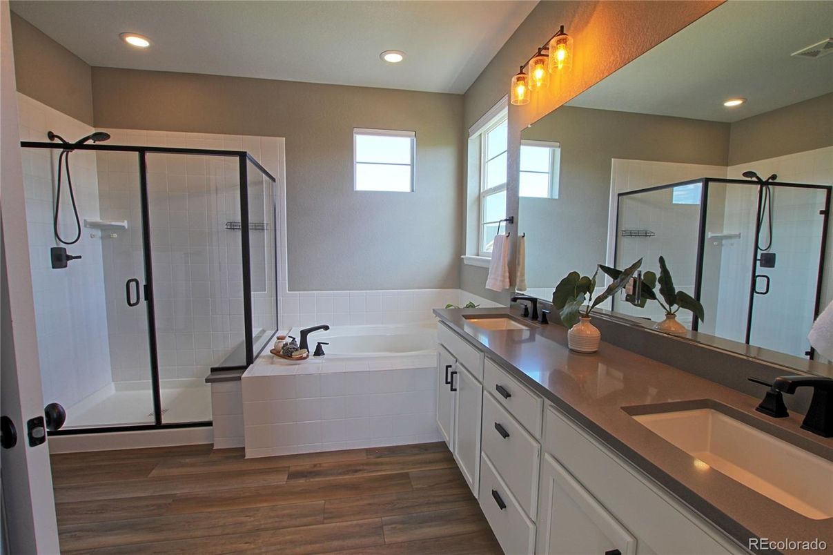 Bathroom, Dual Sink Vanities, Glass Shower, Interior, Recessed Lighting, Wood Texture Flooring