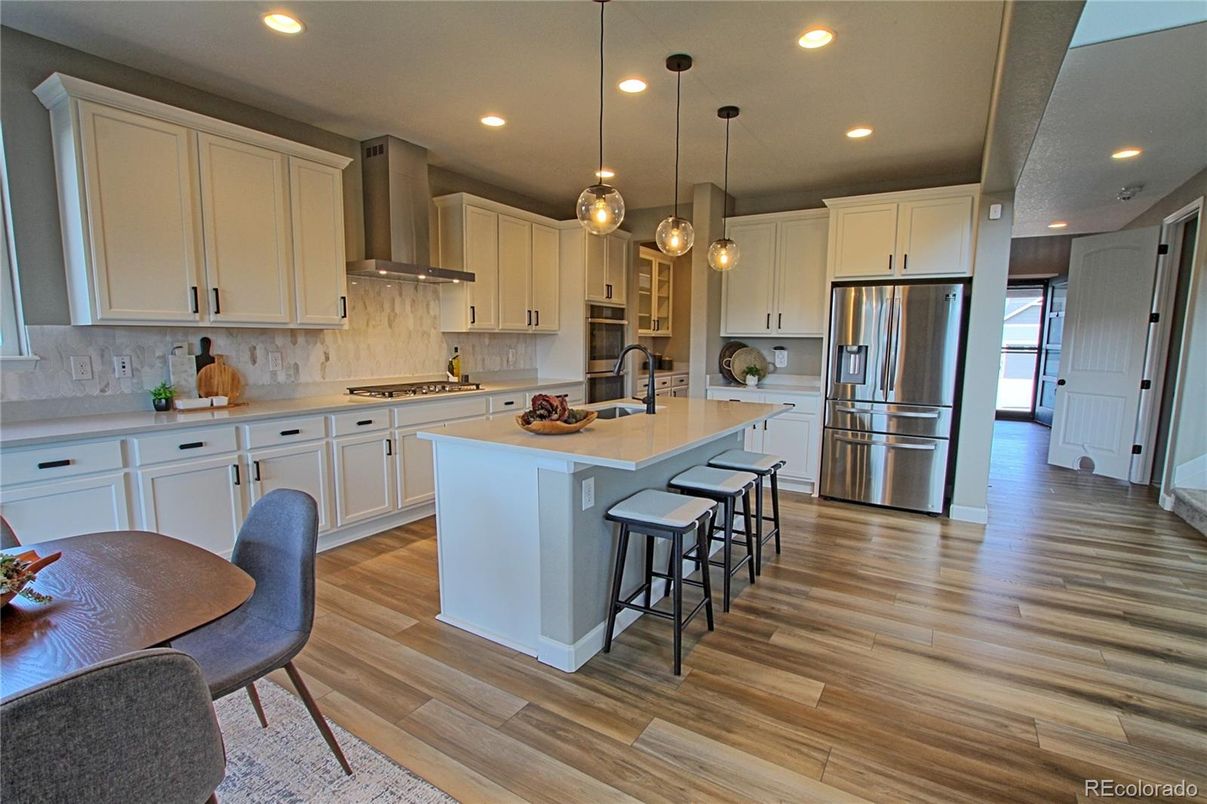 Interior, Kitchen, Pendant Lights, Recessed Lighting, Stainless Steel Appliances, Wood Texture Flooring