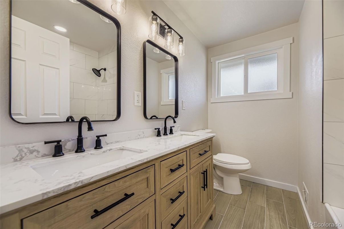 Bathroom, Dual Sink Vanities, Interior, Recessed Lighting, Wood Texture Flooring