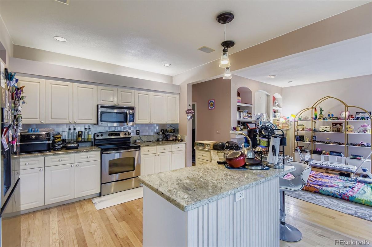 Interior, Kitchen, Pendant Lights, Recessed Lighting, Stainless Steel Appliances, Wood Texture Flooring