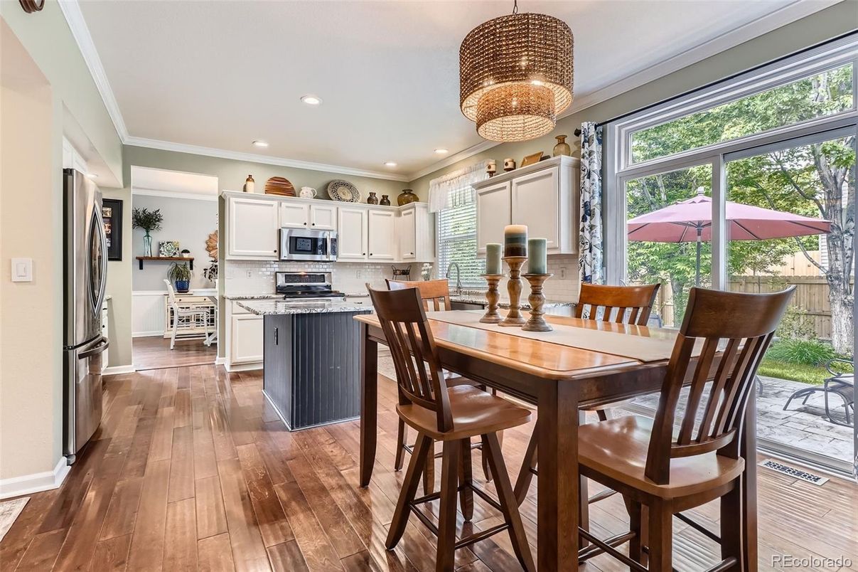 Chandelier, Dining room, Interior, Kitchen, Recessed Lighting, Stainless Steel Appliances, Wood Texture Flooring