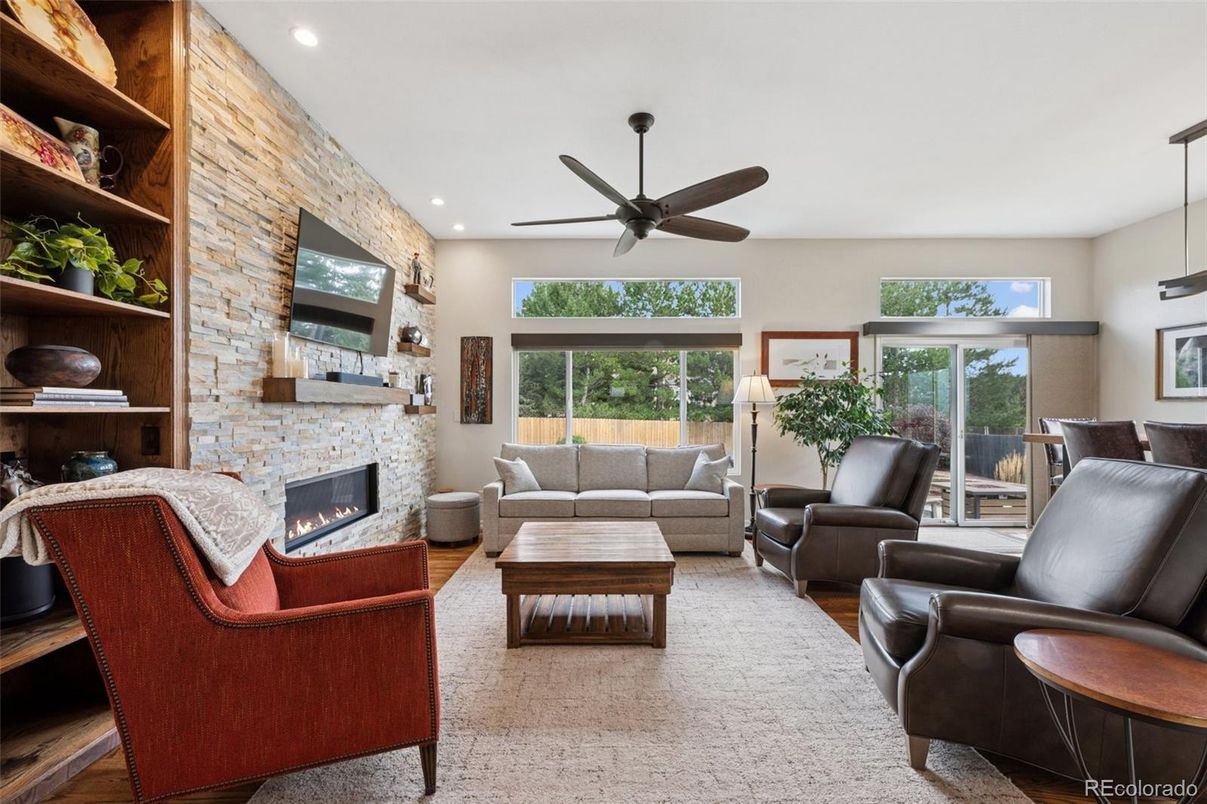 Fireplace, Interior, Living room, Recessed Lighting, Stone Walls, Wood Texture Flooring