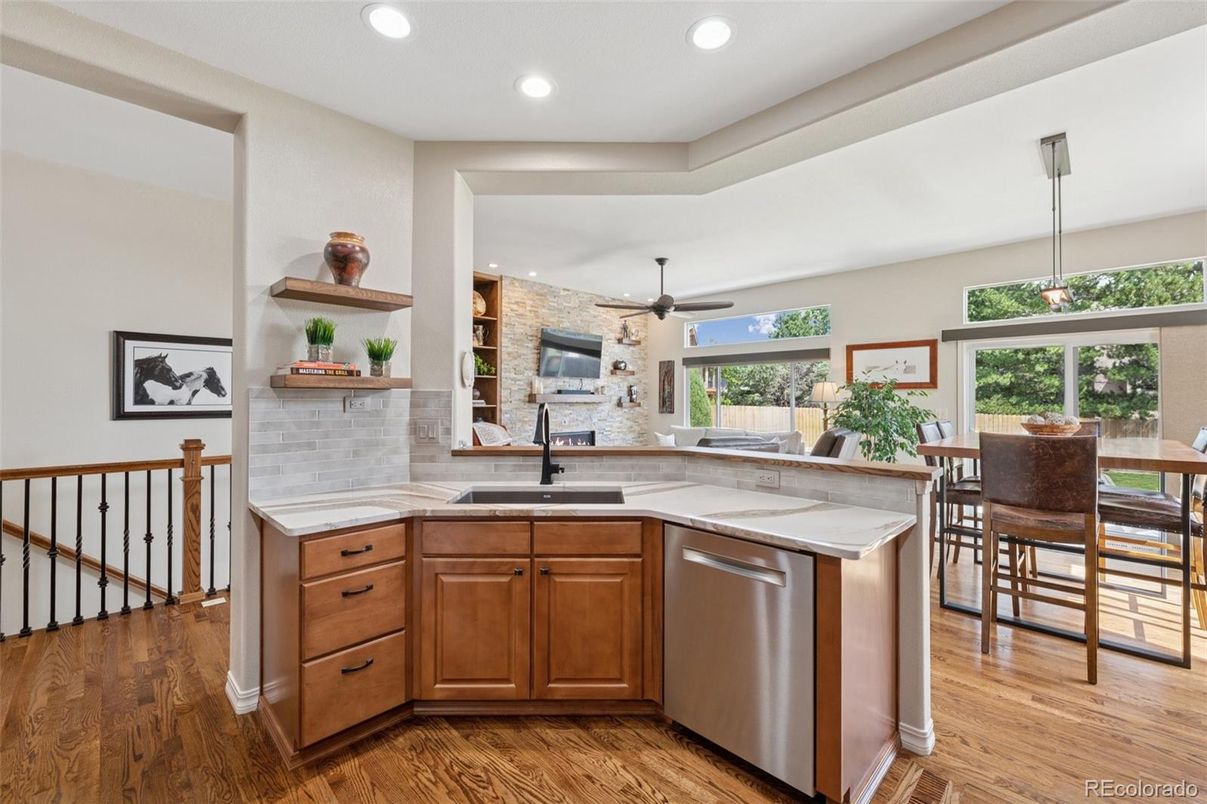 Dining room, Interior, Kitchen, Pendant Lights, Recessed Lighting, Stainless Steel Appliances, Stone Walls, Wood Texture Flooring