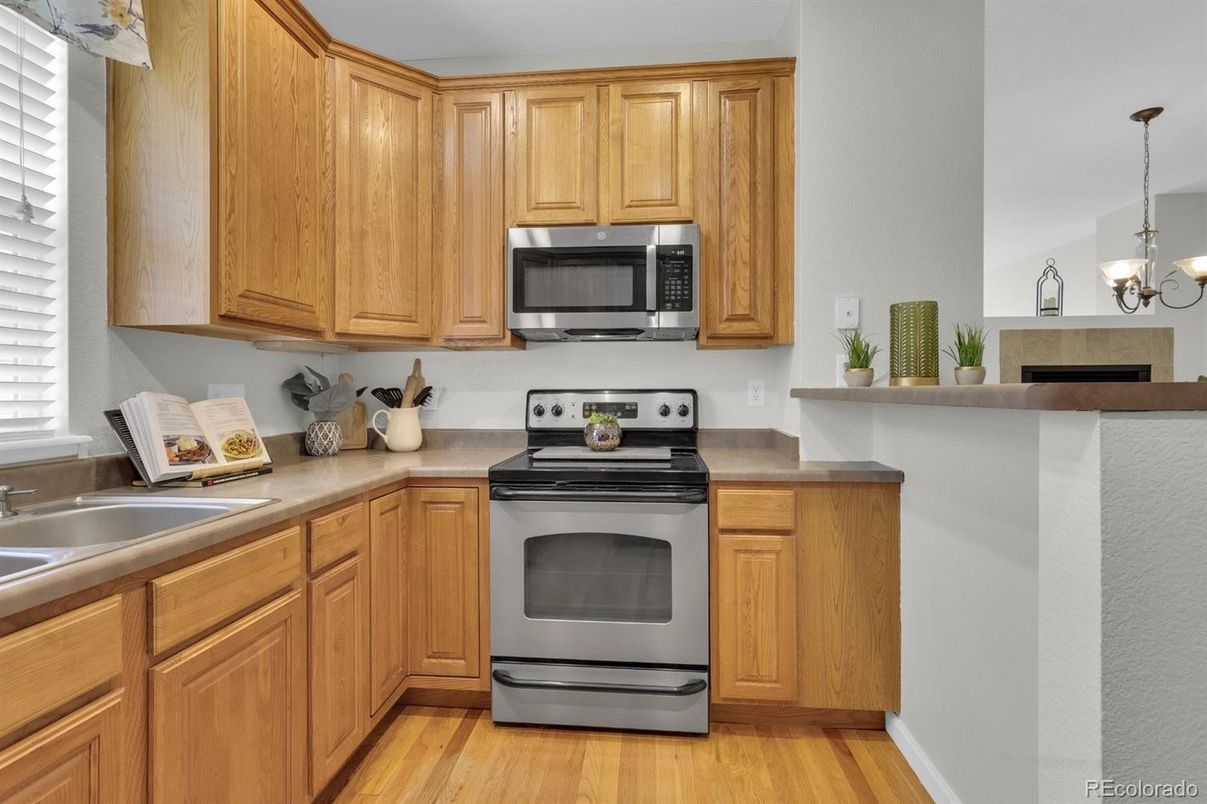 Chandelier, Interior, Kitchen, Pendant Lights, Stainless Steel Appliances, Wood Texture Flooring