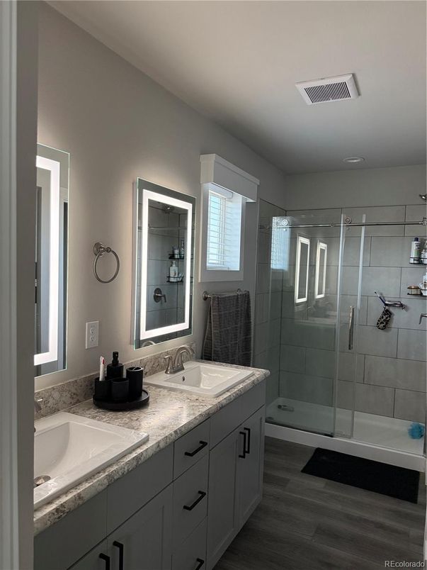 Bathroom, Dual Sink Vanities, Glass Shower, Interior, Wood Texture Flooring