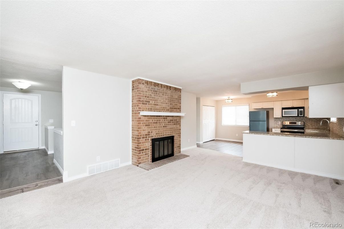 Empty room, Fireplace, Interior, Kitchen, Stainless Steel Appliances