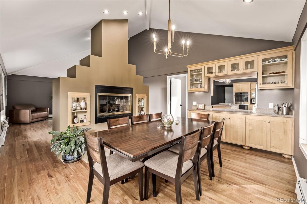 Dining room, Fireplace, Interior, Pendant Lights, Recessed Lighting, Wood Texture Flooring