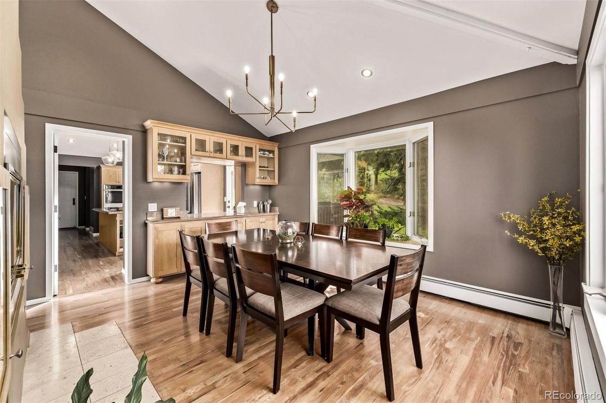Chandelier, Dining room, Interior, Kitchen, Pendant Lights, Recessed Lighting, Stainless Steel Appliances, Wood Texture Flooring