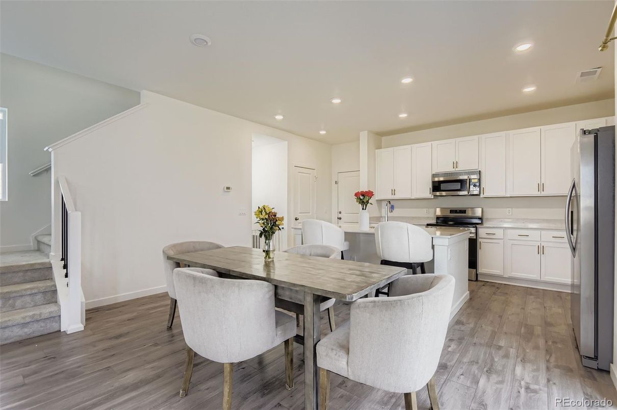Dining room, Interior, Kitchen, Recessed Lighting, Stainless Steel Appliances, Wood Texture Flooring