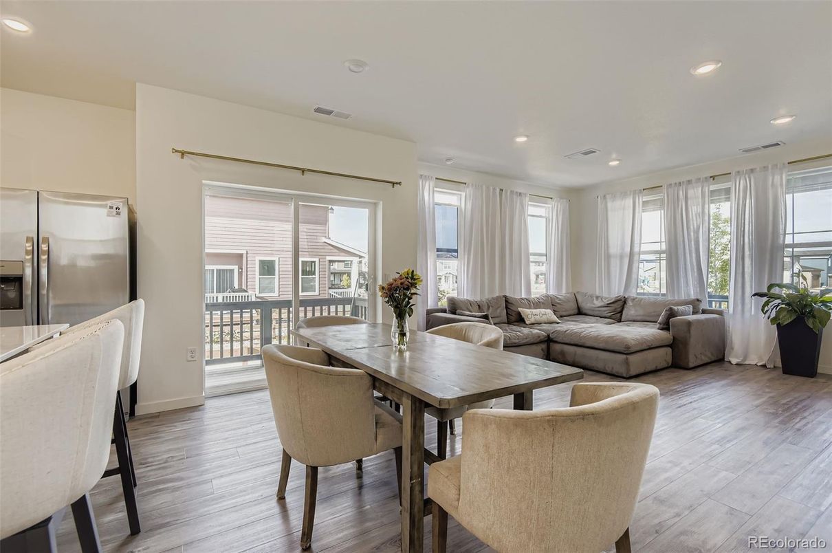 Dining room, Interior, Living room, Recessed Lighting, Stainless Steel Appliances, Wood Texture Flooring