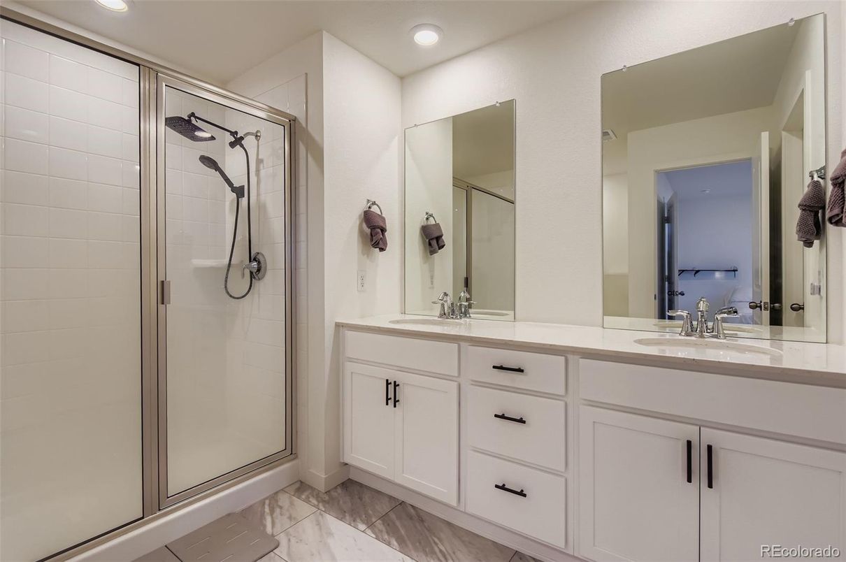 Bathroom, Dual Sink Vanities, Glass Shower, Interior, Marble, Recessed Lighting