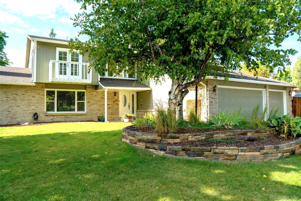 Attached, Backyard, Exterior, Facade, Brick Facade, Split Level