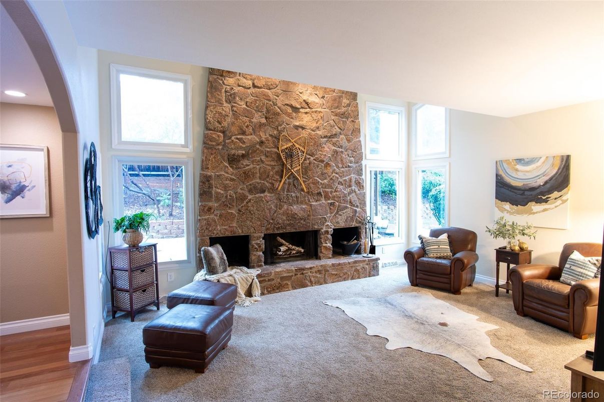 Fireplace, Interior, Living room, Recessed Lighting, Stone Walls, Wood Texture Flooring