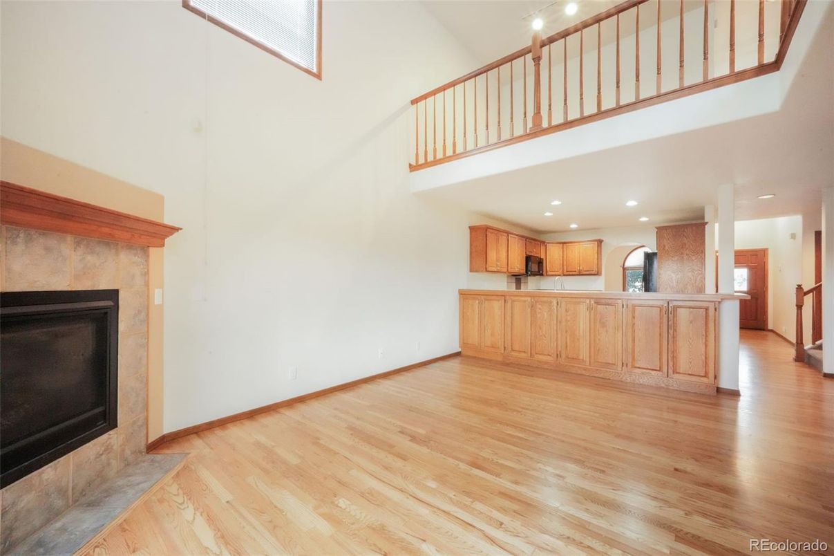 Fireplace, Interior, Kitchen, Recessed Lighting, Wood Texture Flooring