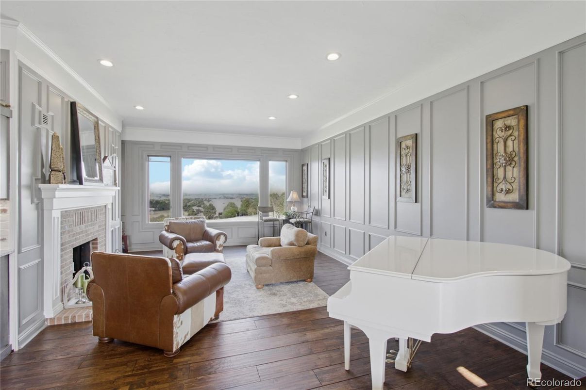 Fireplace, Interior, Living room, Piano, Recessed Lighting, Wood Texture Flooring