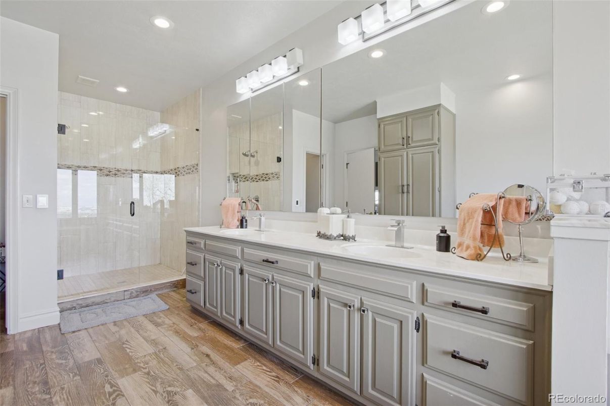 Bathroom, Dual Sink Vanities, Glass Shower, Interior, Recessed Lighting, Wood Texture Flooring