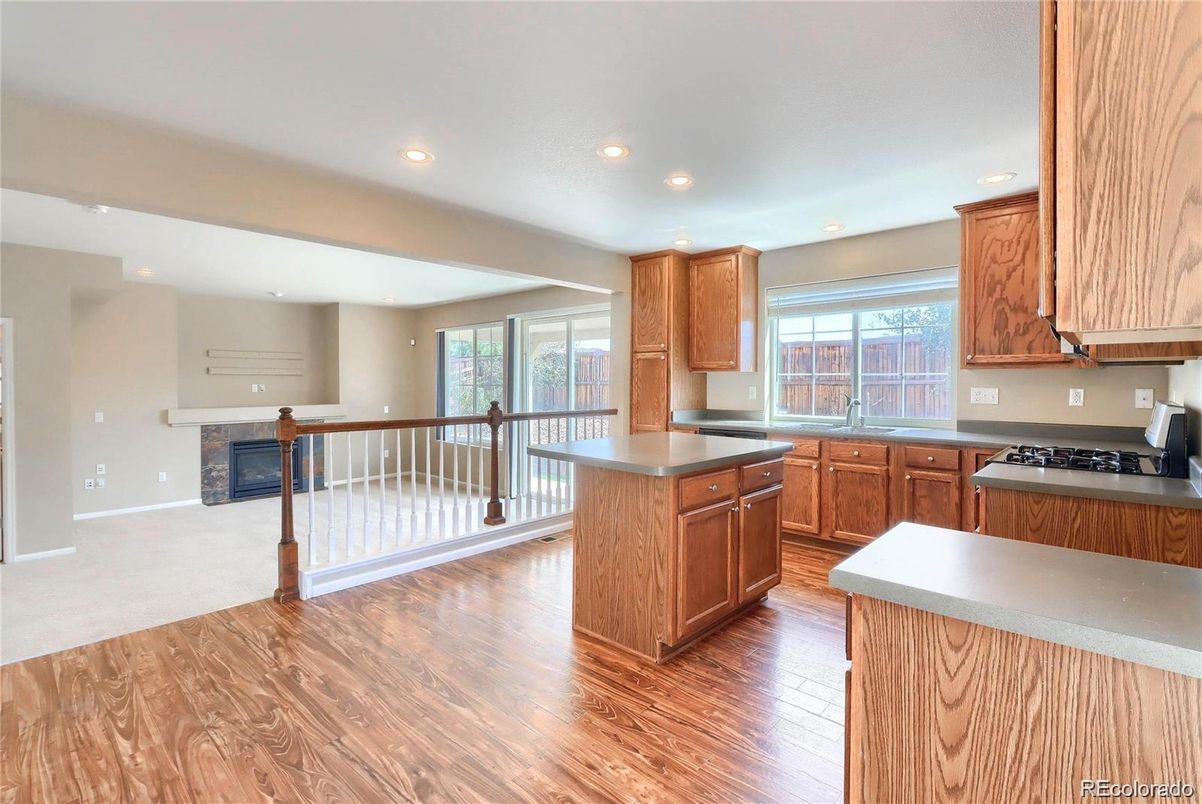 Fireplace, Interior, Kitchen, Recessed Lighting, Wood Texture Flooring