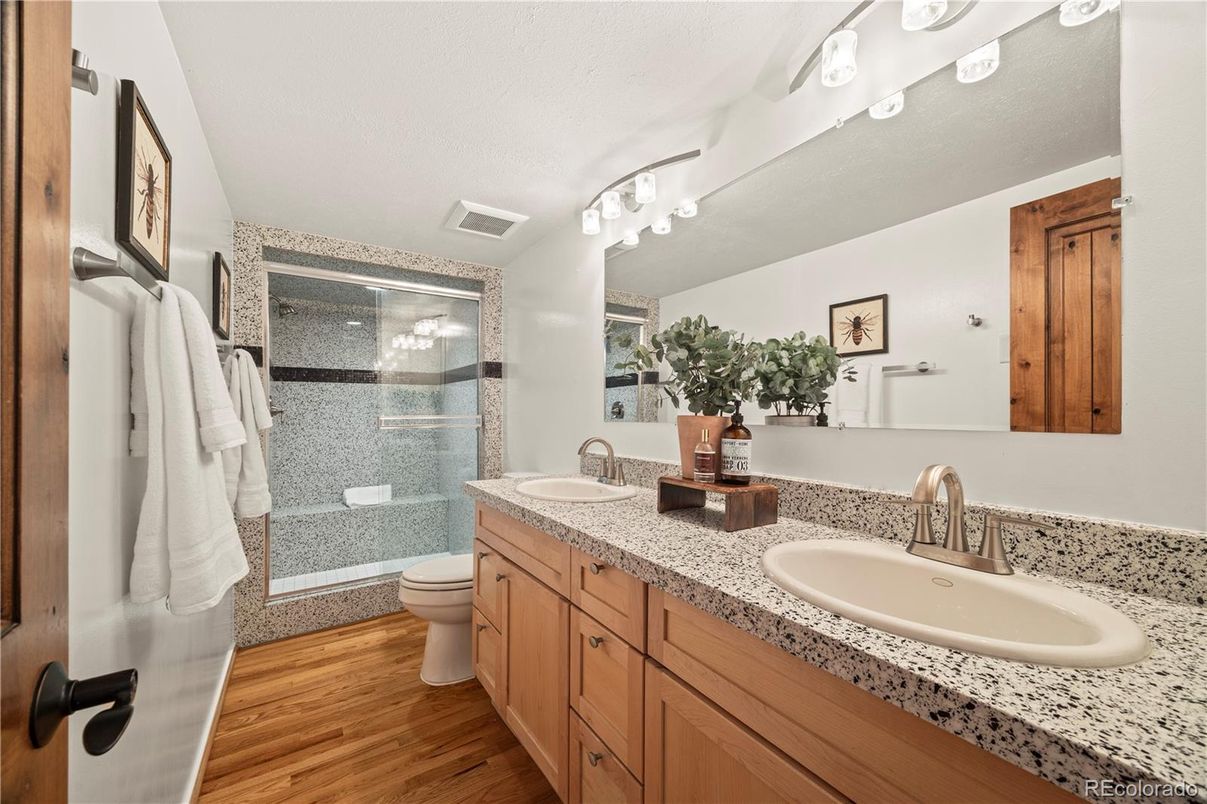 Bathroom, Dual Sink Vanities, Glass Shower, Interior, Wood Texture Flooring