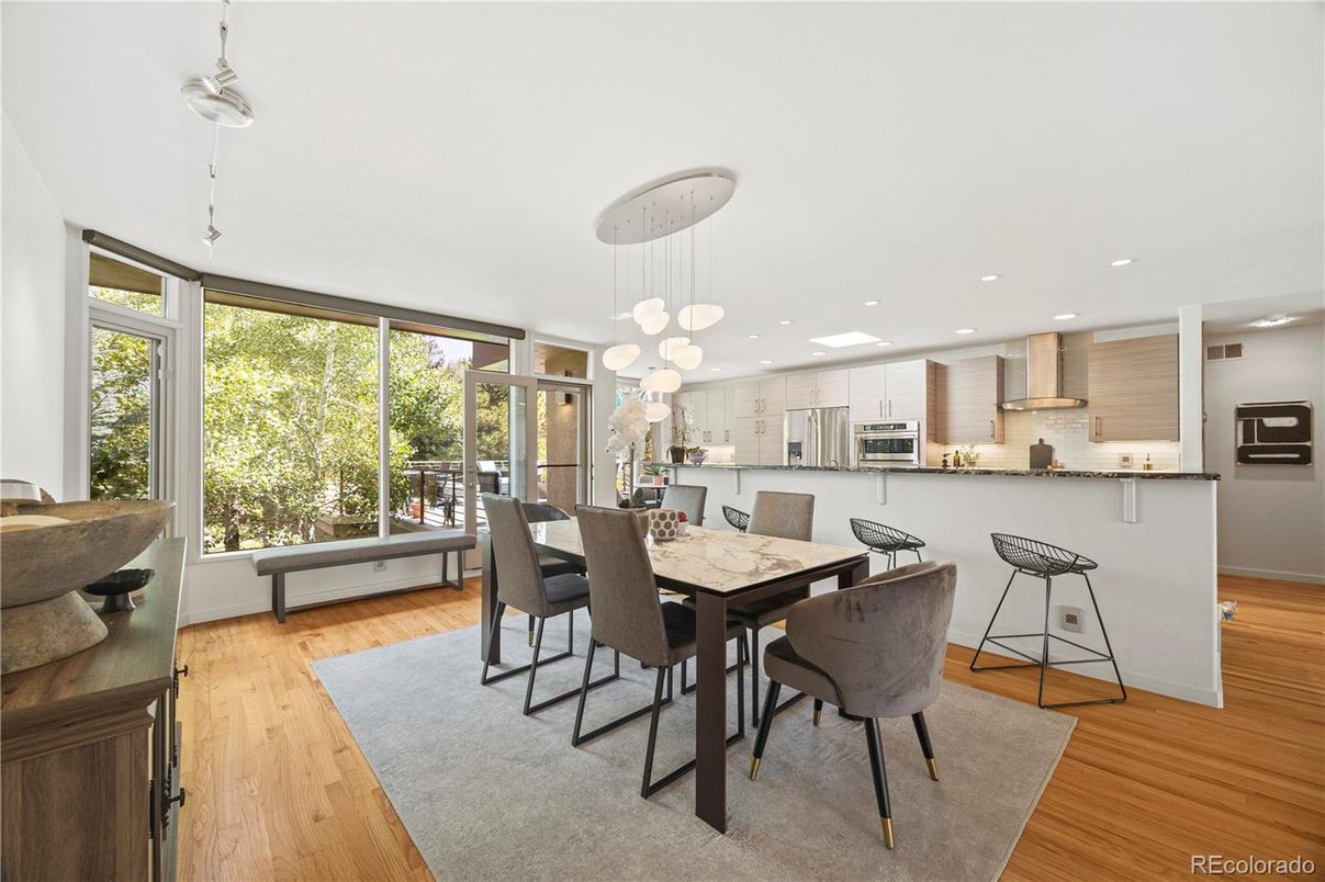 Dining room, Interior, Kitchen, Pendant Lights, Recessed Lighting, Stainless Steel Appliances, Wood Texture Flooring