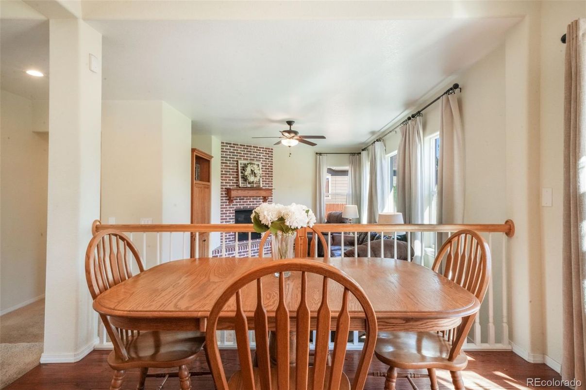 Dining room, Fireplace, Interior, Recessed Lighting, Stone Walls, Wood Texture Flooring