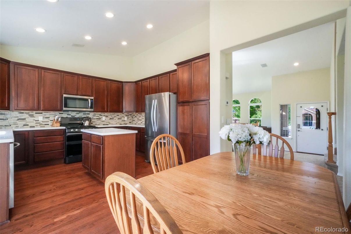 Dining room, Interior, Kitchen, Recessed Lighting, Stainless Steel Appliances, Wood Texture Flooring