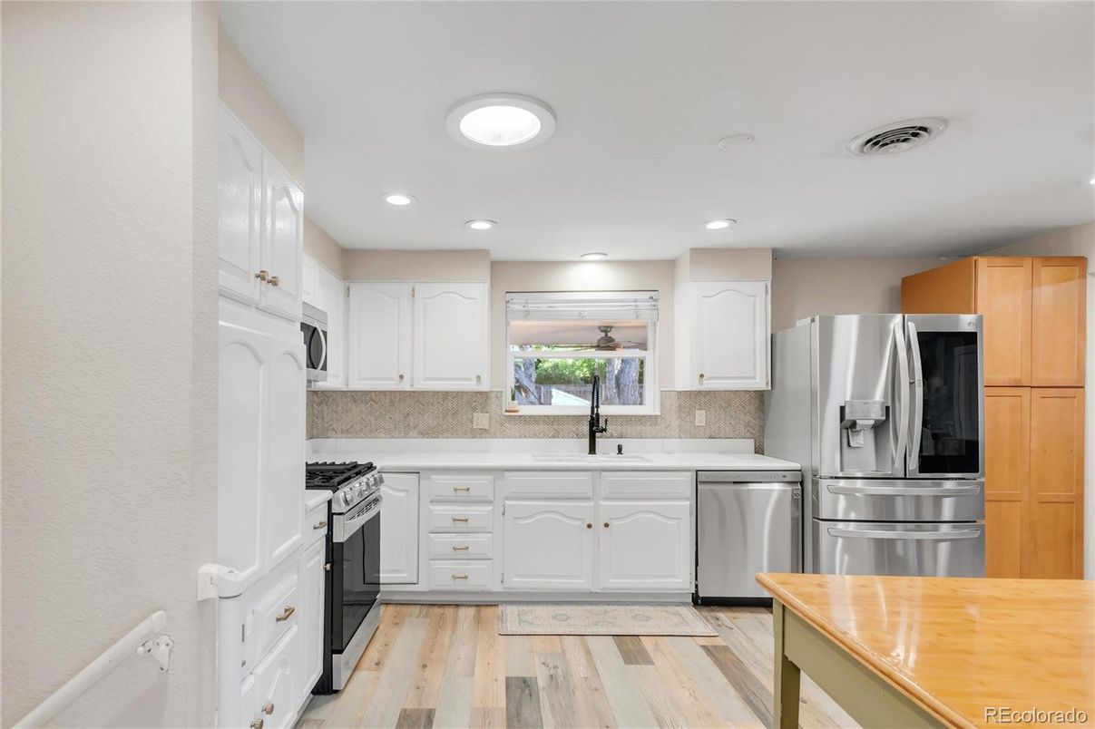 Interior, Kitchen, Recessed Lighting, Stainless Steel Appliances, Wood Texture Flooring