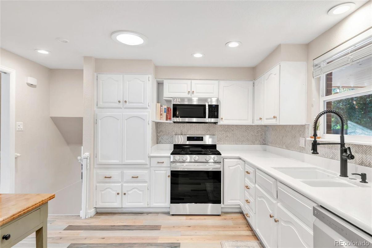 Interior, Kitchen, Recessed Lighting, Stainless Steel Appliances, Wood Texture Flooring