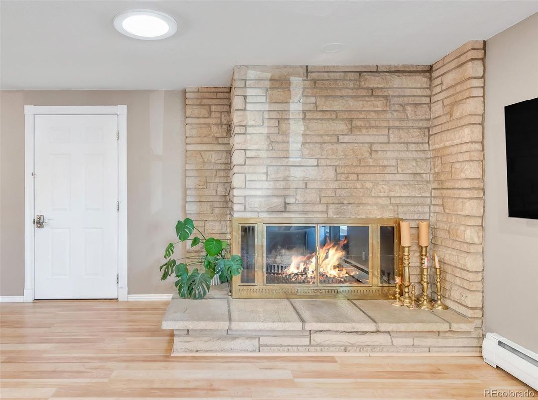 Fireplace, Interior, Recessed Lighting, Stone Walls, Wood Texture Flooring