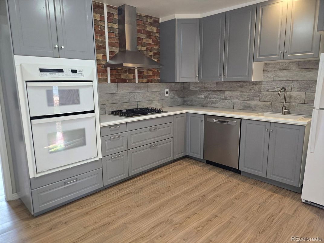 Interior, Kitchen, Stainless Steel Appliances, Stone Walls, Wood Texture Flooring