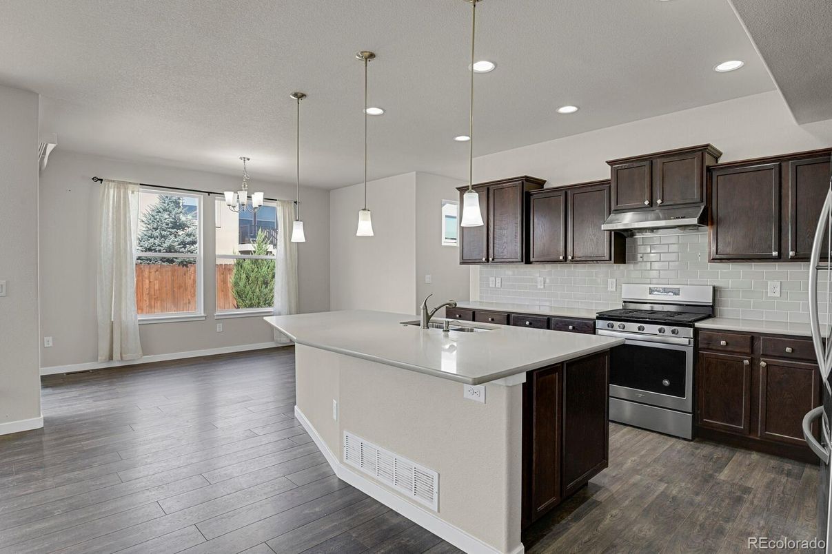 Chandelier, Interior, Kitchen, Pendant Lights, Recessed Lighting, Stainless Steel Appliances, Wood Texture Flooring
