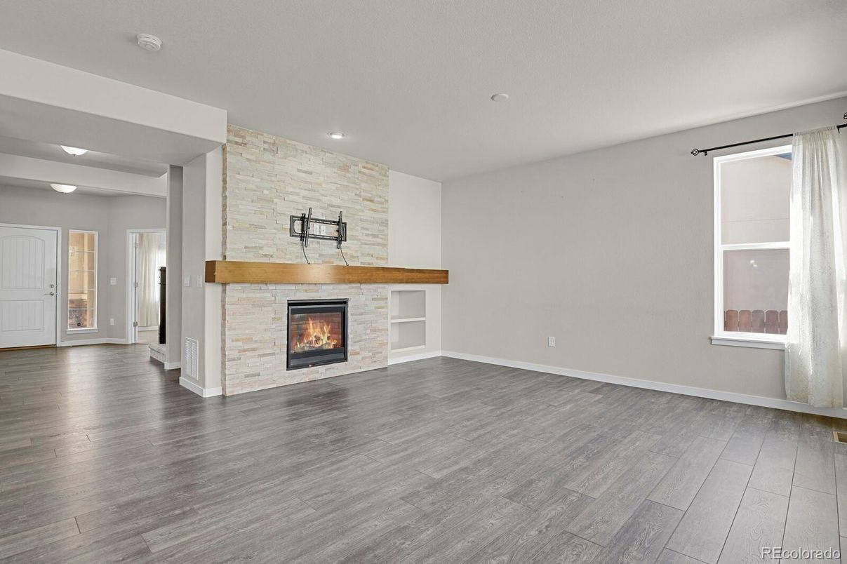 Empty room, Fireplace, Interior, Recessed Lighting, Wood Texture Flooring
