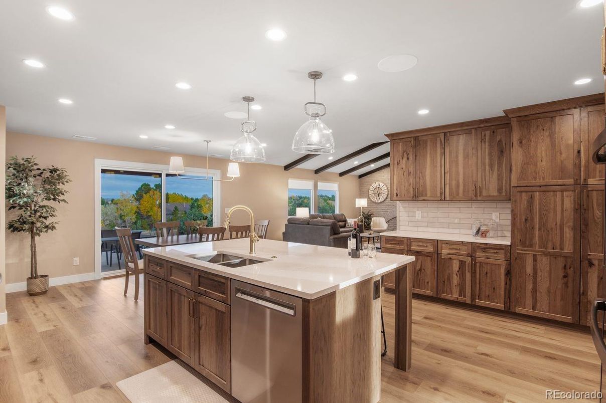 Dining room, Interior, Kitchen, Pendant Lights, Recessed Lighting, Stainless Steel Appliances, Wood Texture Flooring